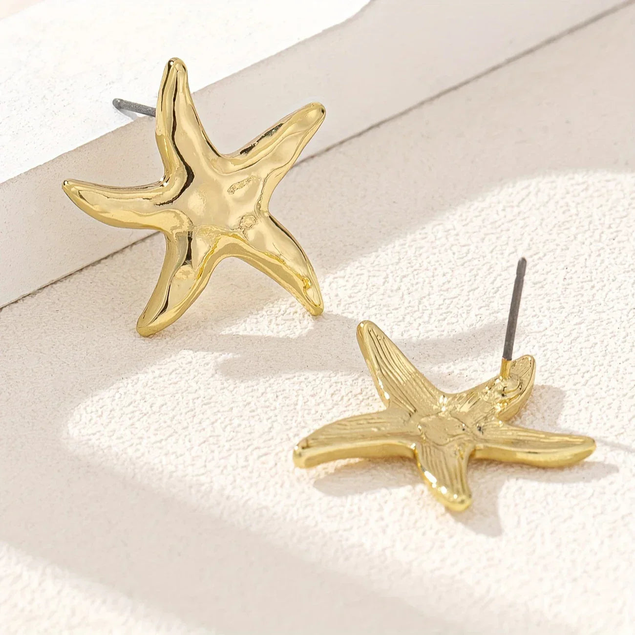 Boucles d'oreilles étoile de mer dorées