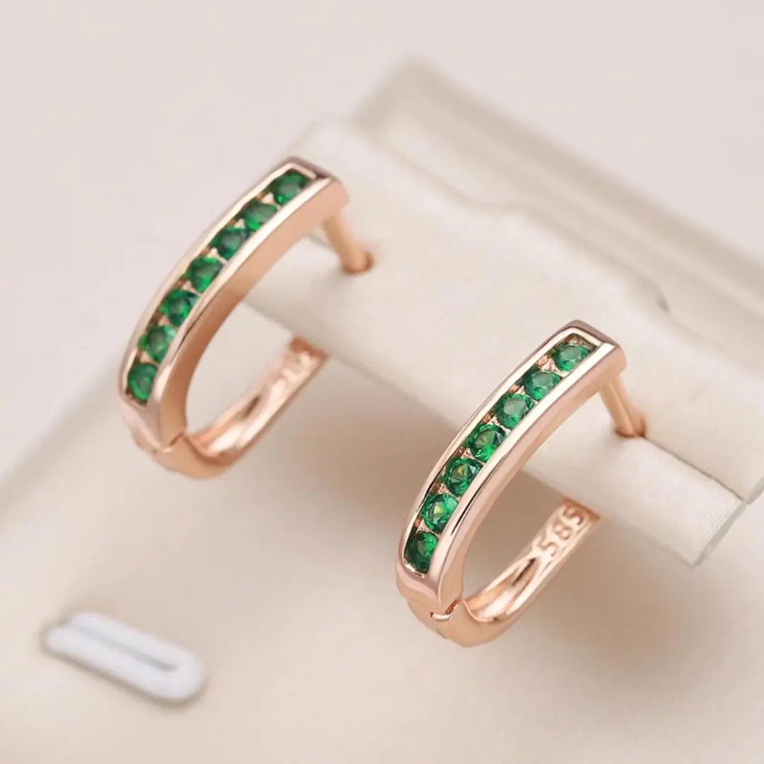 Boucles d'oreilles émeraude et diamant dorées