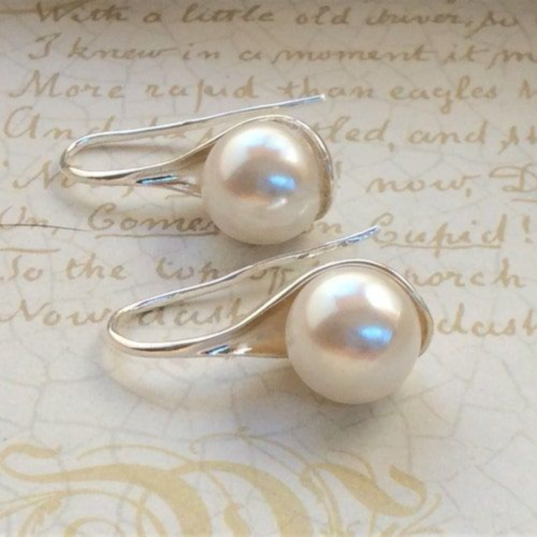 Boucles d'oreilles pendantes en perle vintage