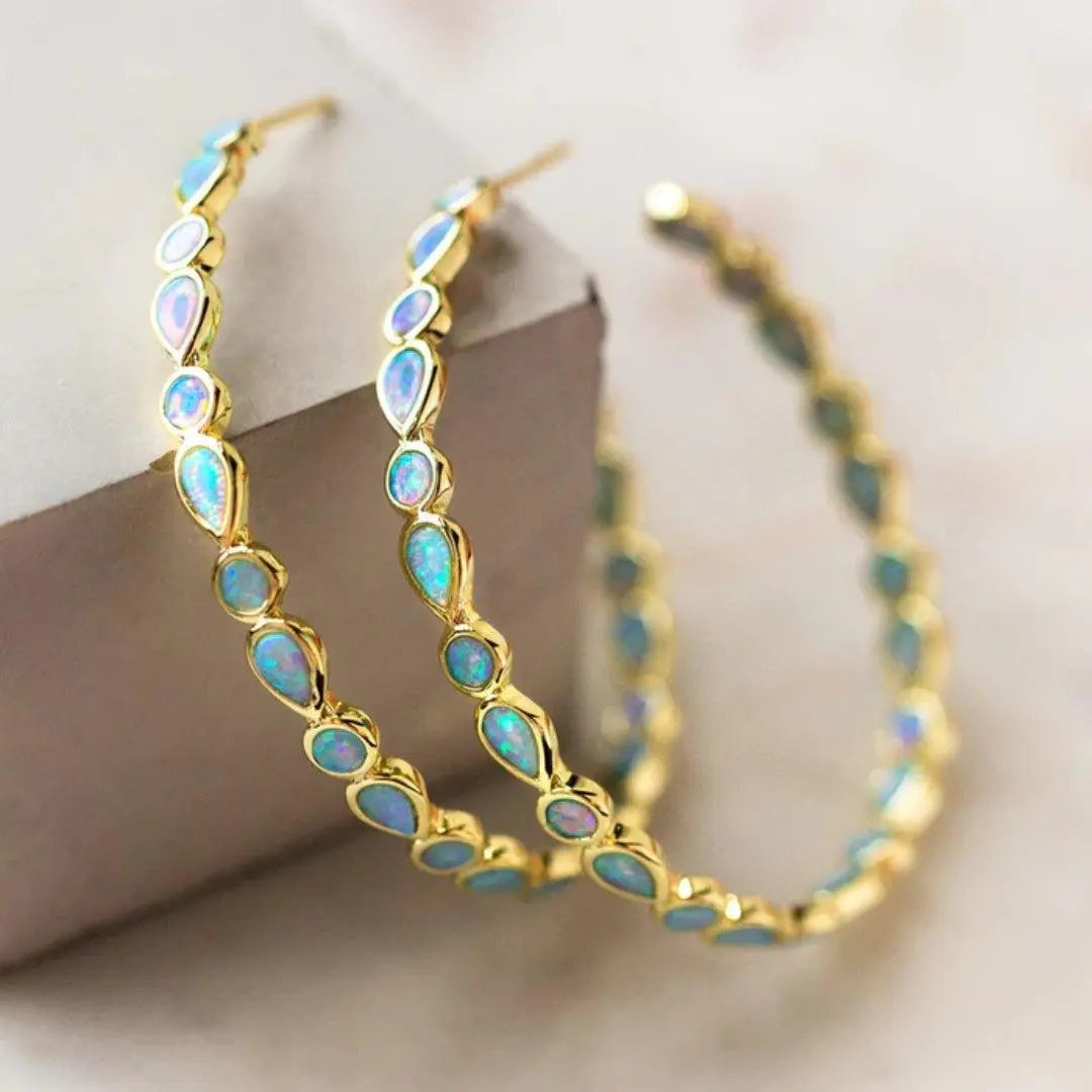 Boucles d'oreilles dorées vintage en opale bleue