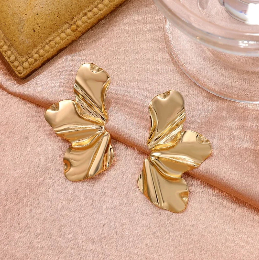 Boucles d'oreilles demi-fleur dorées
