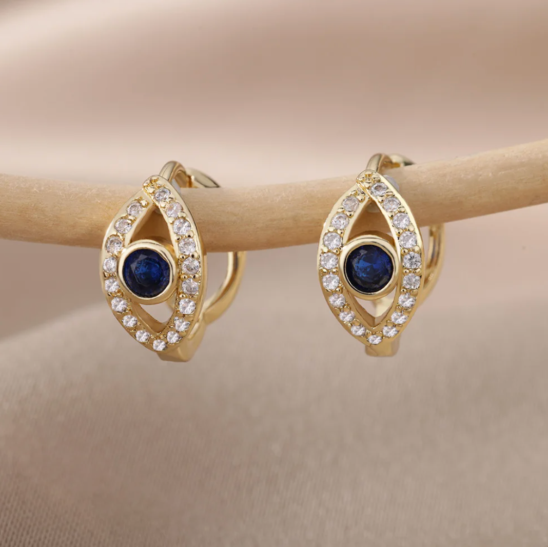 Boucles d'oreilles bouton œil maléfique dorées
