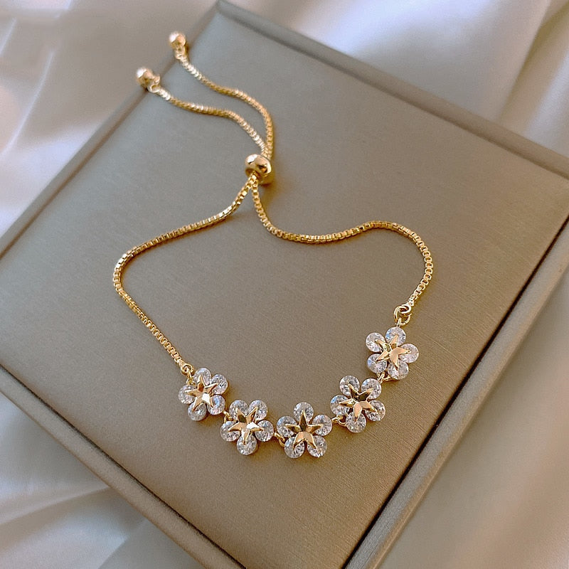 Bracelet floral en cristal doré