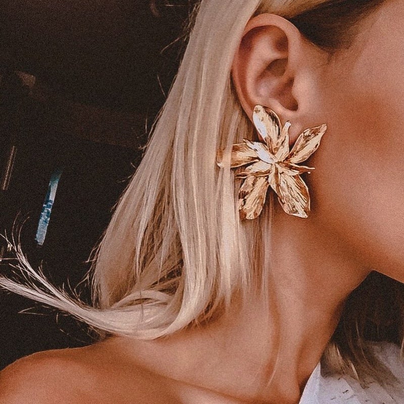 Boucles d'oreilles fleur porte-bonheur dorées
