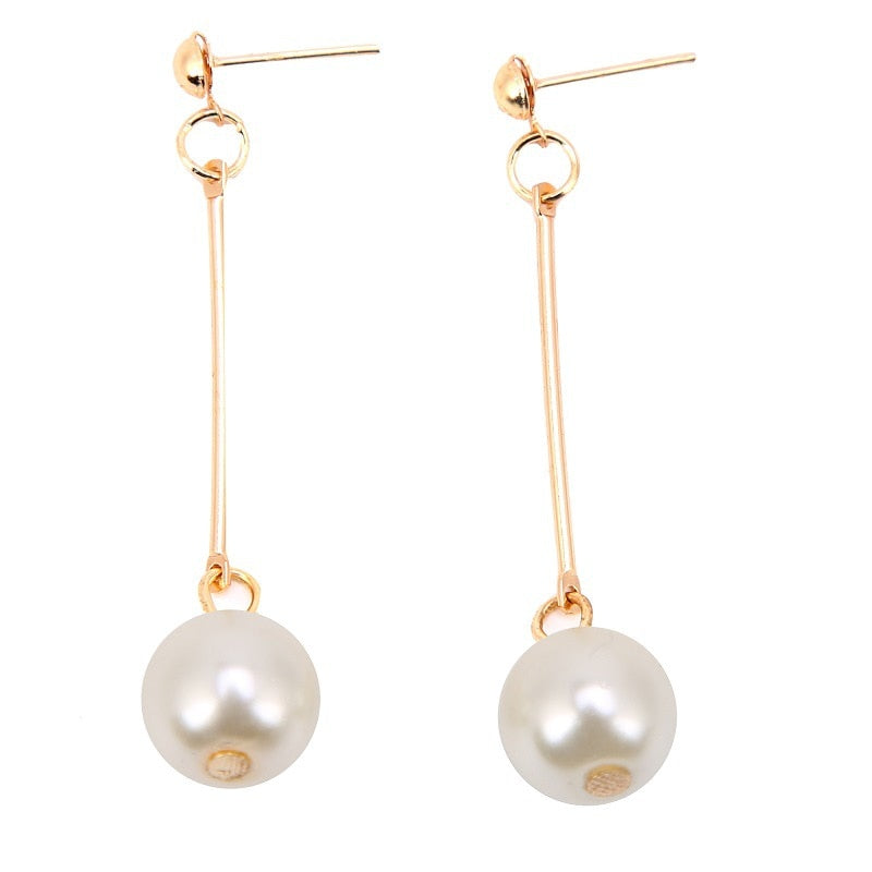 Boucles d'oreilles de luxe pendantes avec perles spéciales