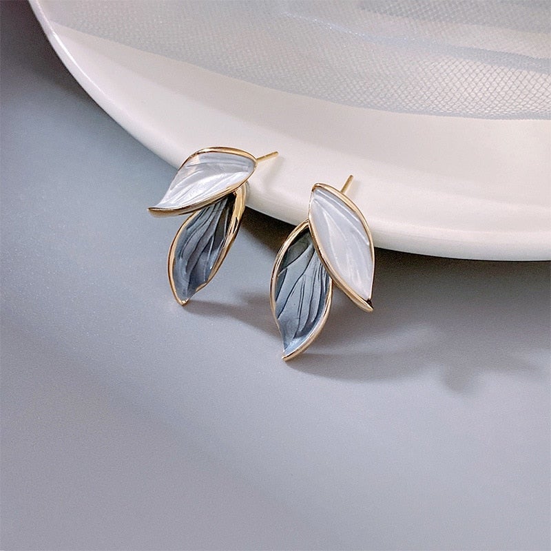 Boucles d'oreilles de luxe en émail ailes porte-bonheur
