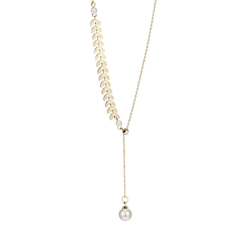 Collier tranquillité en perle dorée