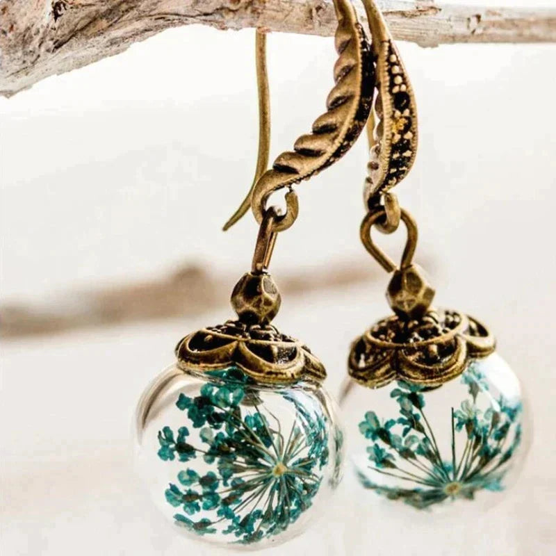 Boucles d'oreilles exotiques naturelles dorées