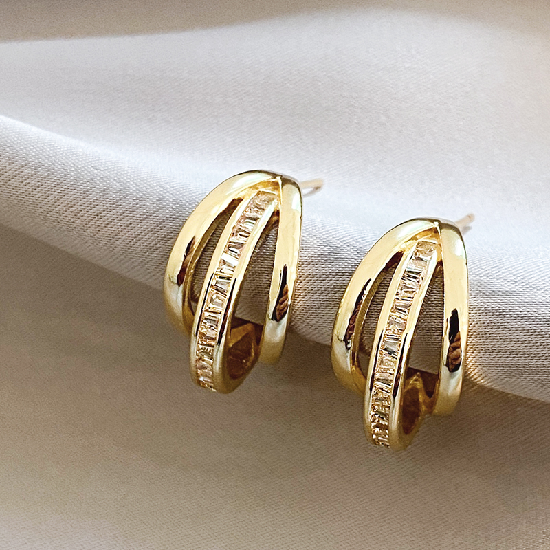 Boucles d'oreilles créoles triples élégantes dorées
