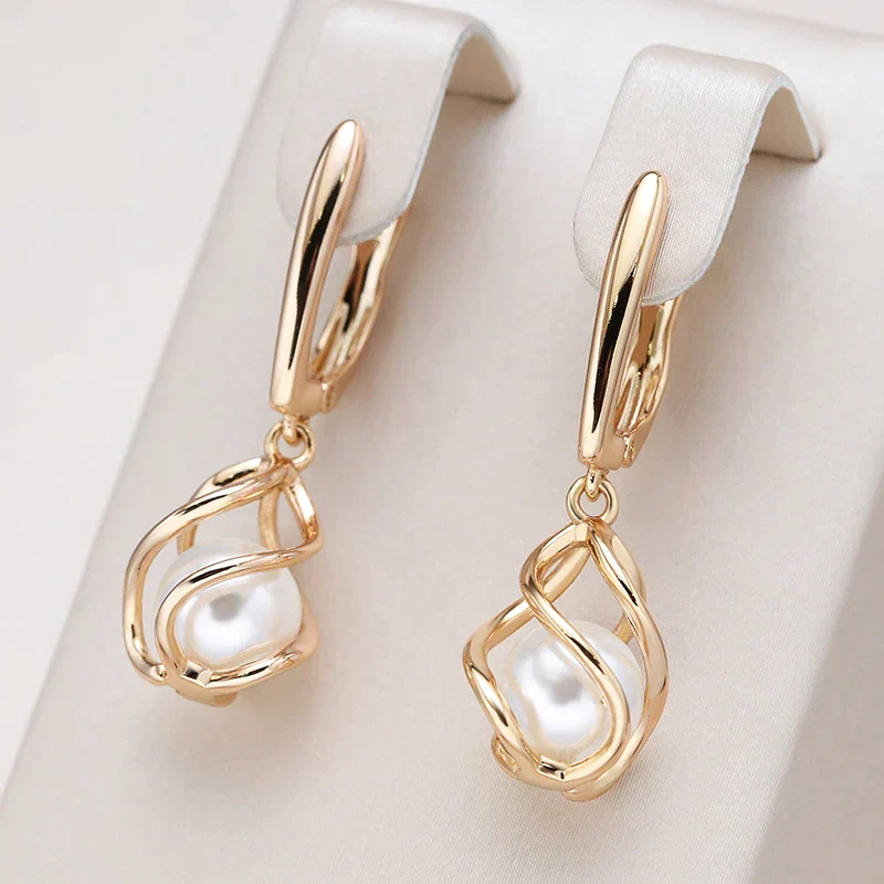 Boucles d'oreilles élégantes en perle dorée