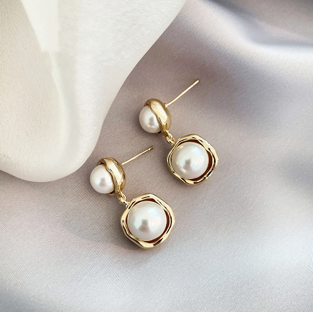 Boucles d'oreilles en perle dorées
