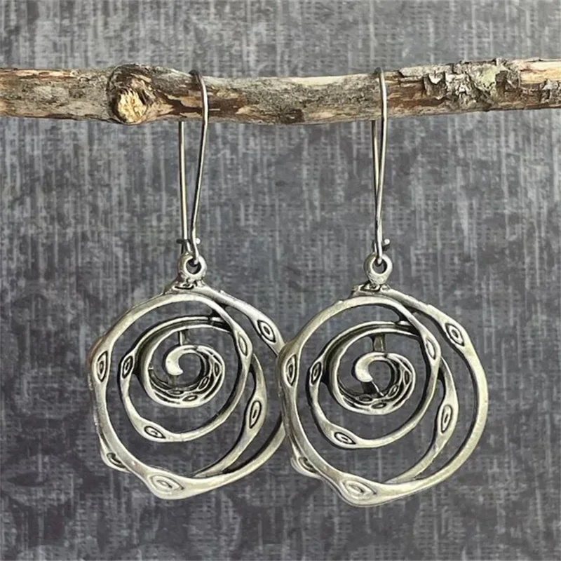 Boucles d'oreilles labyrinthe plaquées argent vintage