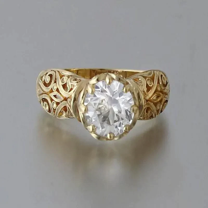 Bague en cristal blanc dorée
