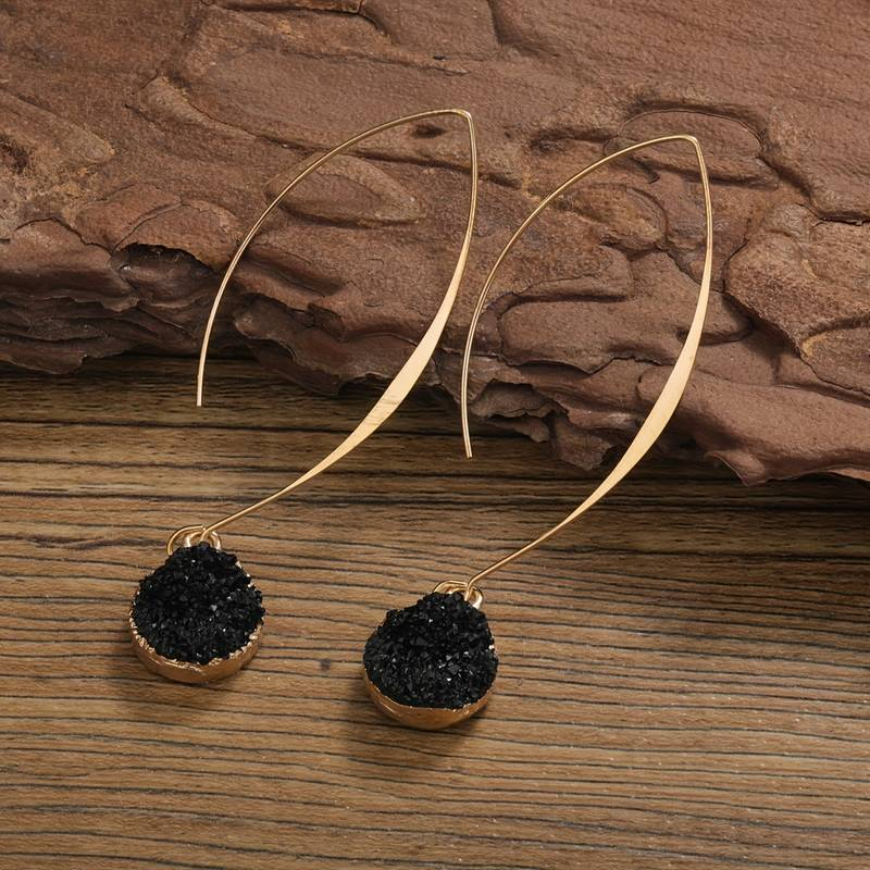 Boucles d'oreilles noires et dorées vintage