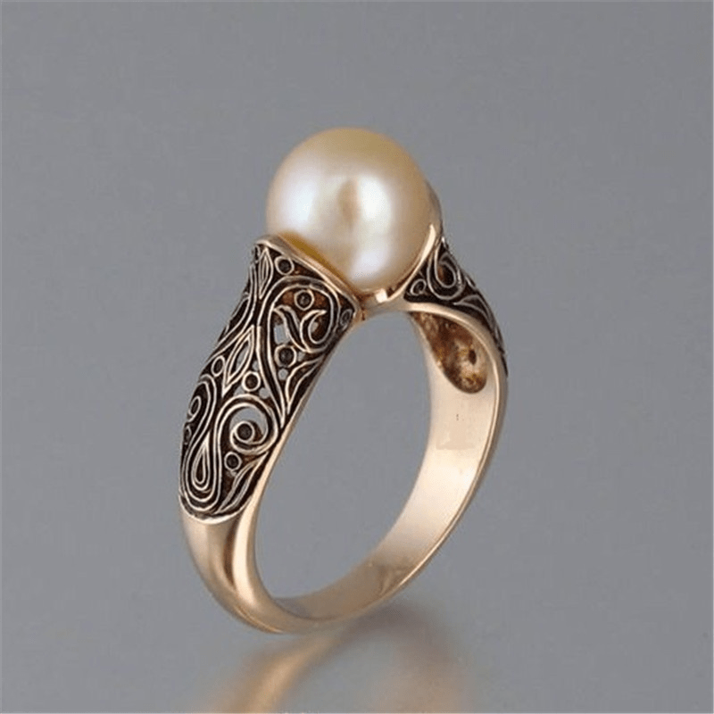 Bague dorée en perle vintage