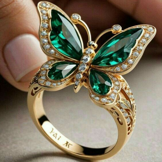 Bague papillon en cristal vert dorée