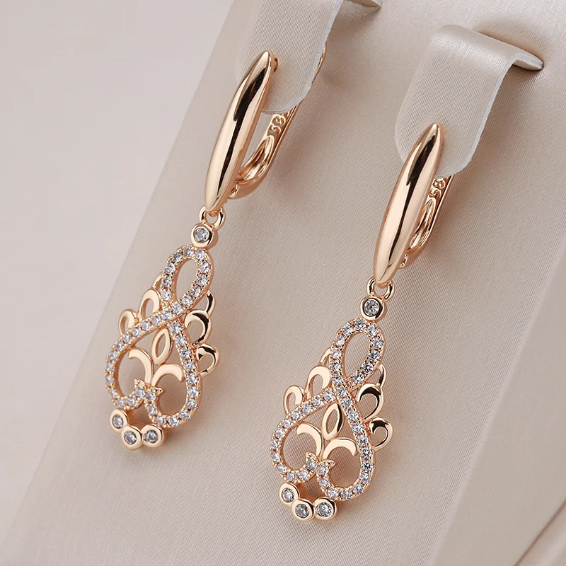 Boucles d'oreilles elfe élégantes en zircone cubique dorées