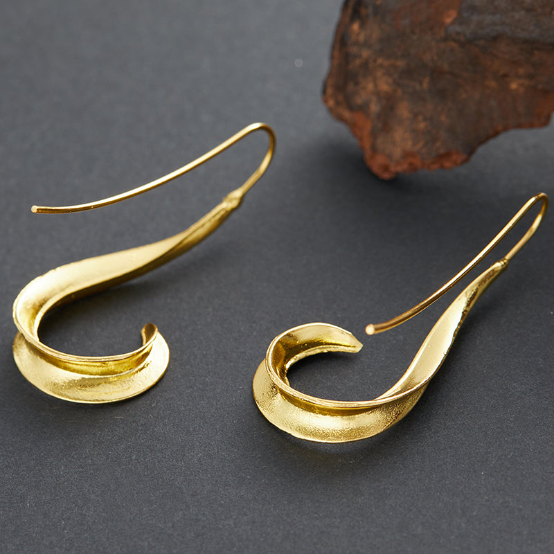 Boucles d'oreilles pendantes dorées vintage