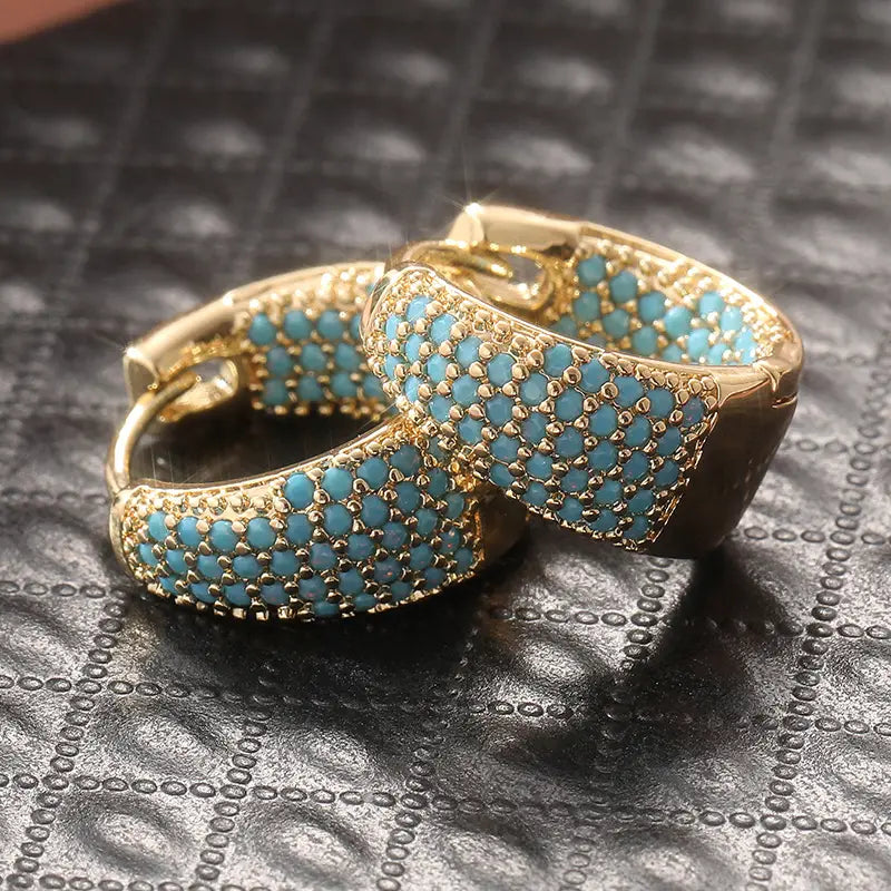 Boucles d'oreilles créoles en perle turquoise dorées Dorées
