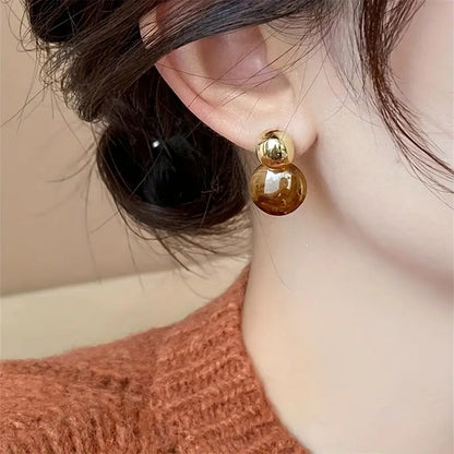 Boucles d'oreilles pendantes ambre Aurélie Dorées