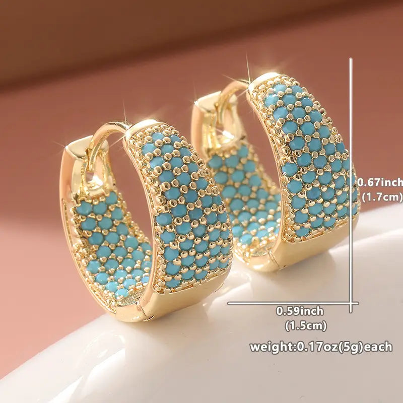 Boucles d'oreilles créoles en perle turquoise dorées Dorées