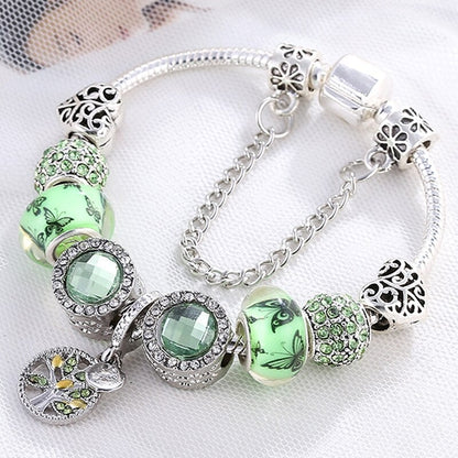 Bracelet couleur argent avec cristal vert imitation