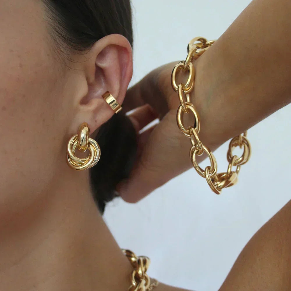 Boucles d'oreilles déclaration entrelacées Dorées
