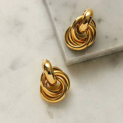 Boucles d'oreilles déclaration entrelacées