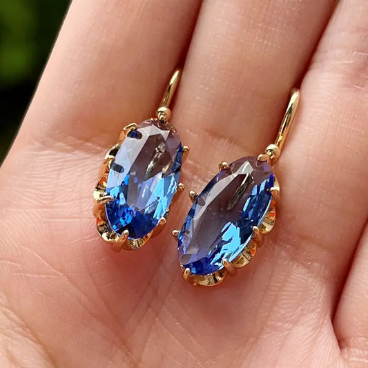 Boucles d'oreilles fleur bleue dorée Dorées