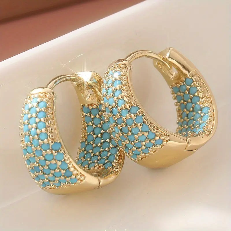 Boucles d'oreilles créoles en perle turquoise dorées Dorées