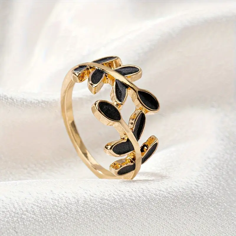 Bague feuille noire dorée